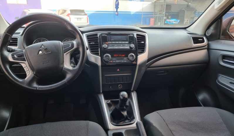 
								MITSUBISHI L200 GASOLINA 2023 full									