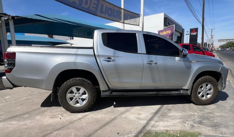
								MITSUBISHI L200 GASOLINA 2023 full									